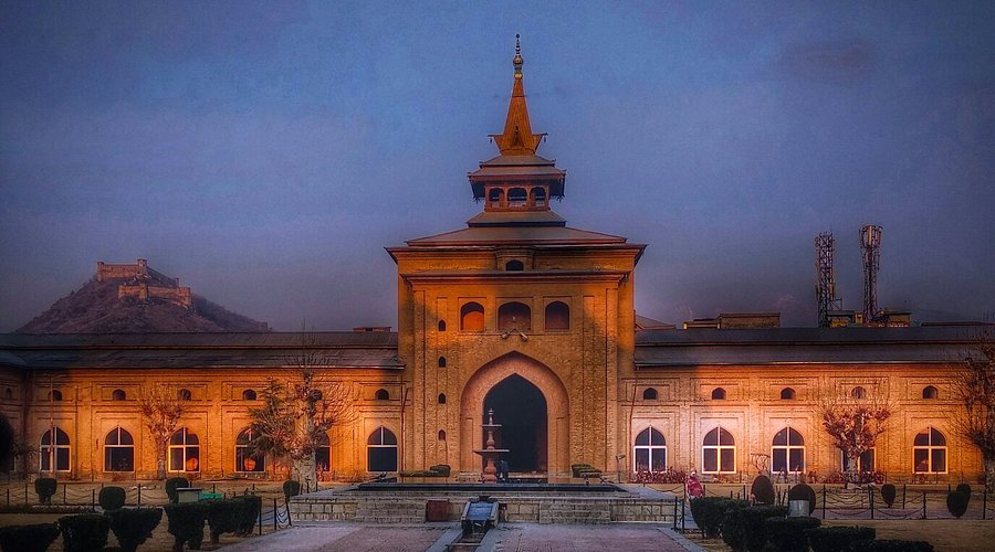 Jamia Masjid Srinagar Guide History Tips and Tour Packages Jamia Masjid Srinagar: A 600-Year-Old Wooden Wonder in Kashmir Jamia Masjid Srinagar Guide: History, Tips, and Tour Packages Nestled in the heart of Srinagar’s old city, Jamia Masjid stands as a testament to Kashmir’s rich cultural heritage and architectural brilliance. Built in 1402 CE by Sultan Sikandar, this majestic mosque is not just a place of worship but a symbol of resilience, harmony, and artistic ingenuity. With its towering deodar wood pillars, sprawling courtyard, and Indo-Saracenic design, Jamia Masjid offers visitors a glimpse into Kashmir’s soul—a place where silence speaks volumes through its wooden grandeur and historical significance . A Journey Through History Jamia Masjid was commissioned by Sultan Sikandar in 1394 CE and completed in 1402 CE under the guidance of Mir Mohammad Hamadani, son of the revered Persian saint Mir Sayyid Ali Hamadani. Over the centuries, the mosque has witnessed numerous reconstructions due to fires in 1479, 1620, and 1674, each time rising from the ashes with renewed splendor. Its enduring legacy is a reflection of Kashmir’s unwavering spirit, making it a must-visit destination for history enthusiasts and spiritual seekers alike . Architectural Marvel Unlike the red sandstone mosques of Mughal India, Jamia Masjid boasts a unique blend of Persian, Central Asian, and Kashmiri architectural styles. Key features include: • 378 Deodar Wood Pillars: These towering pillars, each 21 feet high, support the mosque’s structure and create a mesmerizing symmetry. • Pyramidal Roof: Designed to withstand heavy snowfall, the sloping roof is adorned with wooden tiles, adding to the mosque’s rustic charm. • Spacious Courtyard: The courtyard can accommodate up to 33,333 worshippers, making it one of the largest mosques in Kashmir. • Four Turrets: These corner turrets, topped with pyramidal roofs, offer panoramic views of Srinagar and are interconnected by spacious halls. The mosque’s design prioritizes functionality and spirituality, with minimal ornamentation that emphasizes simplicity and tranquility . Cultural and Spiritual Significance Jamia Masjid is the epicenter of religious life in Kashmir. Every Friday, thousands of devotees gather here for congregational prayers, creating an atmosphere of unity and devotion . The mosque also plays a vital role during Islamic festivals like Eid and Ramadan, where the courtyard comes alive with prayers and celebrations. Beyond its religious significance, Jamia Masjid has been a platform for socio-political discourse, reflecting the region’s complex history . Visitor Experience Visiting Jamia Masjid is a sensory journey. As you step into its courtyard, the hustle of Nowhatta’s bustling markets fades away, replaced by a profound sense of peace. The aroma of aged wood, the sight of sunlight filtering through the pillars, and the sound of prayers create an unforgettable experience. Visitors are advised to: • Dress modestly and remove shoes before entering. • Avoid visiting during prayer times (especially Fridays) unless participating in worship. • Explore nearby attractions like the Khanqah of Shah e Hamdan and traditional bazaars selling Kashmiri handicrafts. Plan Your Visit with Denizen Holidays Jamia Masjid is a highlight of any trip to Kashmir. Whether you’re planning a romantic Honeymoon Tour, a fun-filled Family Trip, or a Get-together Trip package, this iconic mosque deserves a spot on your itinerary. At Denizen Holidays, we specialize in crafting personalized Kashmir Tour Packages that include Jamia Masjid, Dal Lake, Mughal Gardens, and other gems of the valley. Ready to explore Kashmir’s spiritual heart? Visit us at www.kashmirtourpackage.co or WhatsApp 9906250867 to book your journey today! Q&A: Everything You Need to Know About Jamia Masjid Q: What is the best time to visit Jamia Masjid? A: The mosque is accessible year-round, but spring (March-May) and autumn (September-November) offer pleasant weather. Avoid winter if you’re sensitive to cold, as Srinagar experiences heavy snowfall . Q: How many pillars does Jamia Masjid have? A: The mosque is supported by 378 deodar wood pillars, each standing 21 feet high and arranged in a symmetrical pattern . Q: Can non-Muslims visit Jamia Masjid? A: Yes, non-Muslims are welcome outside prayer times. However, visitors should dress modestly and respect religious practices . Q: What is the capacity of Jamia Masjid? A: The courtyard can accommodate up to 33,333 worshippers, making it one of the largest mosques in India . Q: How can I include Jamia Masjid in my Kashmir tour? A: Our Kashmir Trip Package includes a guided visit to Jamia Masjid, along with other iconic sites like Dal Lake and Gulmarg. Contact us for a customized itinerary. Q: Is photography allowed inside the mosque? A: Photography is generally permitted, but it’s advisable to check with local authorities and avoid disturbing worshippers . Q: Why is Jamia Masjid unique compared to other mosques in India? A: Its wooden architecture, sloping roofs, and blend of Indo-Saracenic styles set it apart from stone-based Mughal mosques like Delhi’s Jama Masjid . ________________________________________ Why Choose Denizen Holidays? At Denizen Holidays, we ensure your trip to Kashmir is seamless and memorable. Our Kashmir Tour Packages are designed for all types of travelers—whether you’re on a Honeymoon Tour, Family Trip, or a Get-together Trip. From logistics to guided tours, we handle everything so you can focus on experiencing Kashmir’s magic. Don’t wait! Visit www.kashmirtourpackage.co or message us on WhatsApp 9906250867 to book your adventure today.